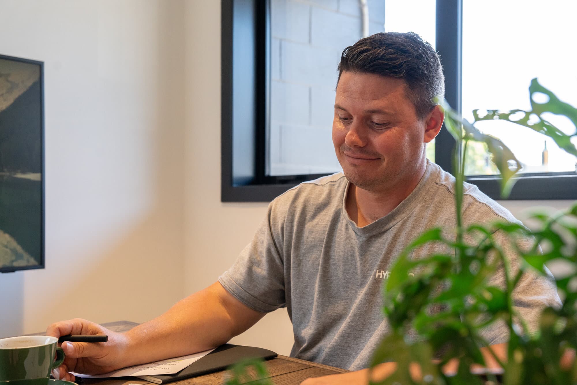 Callum, founder of Hyperbaric NZ, at his desk